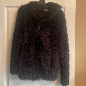 Black fuzzy warm jacket.